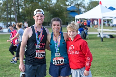 family-with-medals-at-the-end-of-a-race.jpg